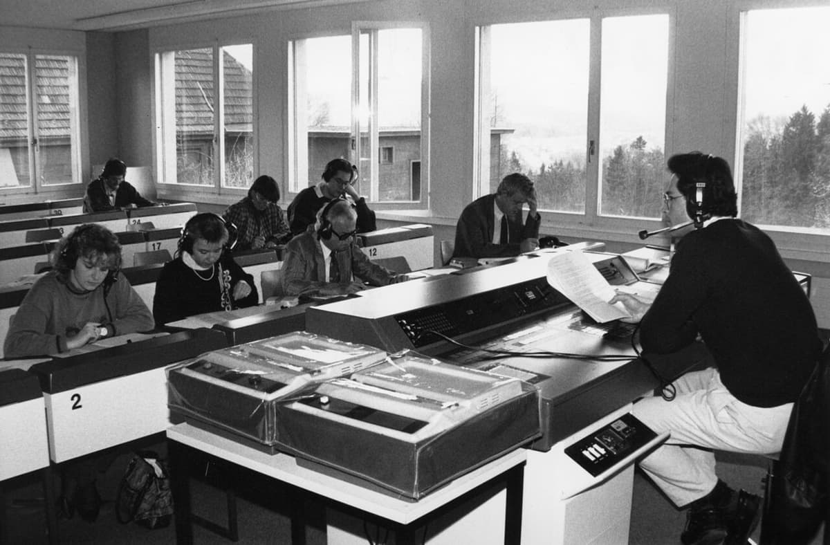 Students wearing headphones during an intensive language course in a 1990 university language lab — the era when second language shadowing research moved into classrooms